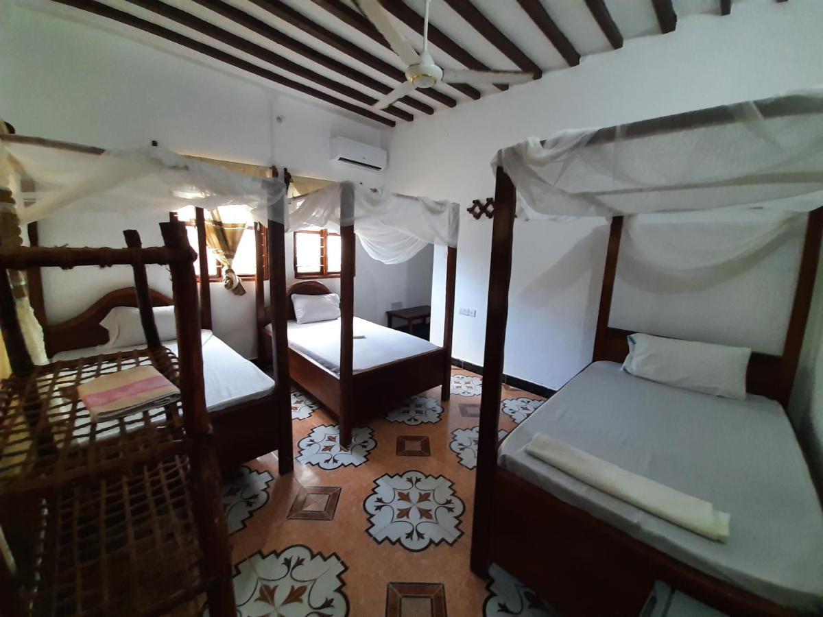 Ames Nungwi Quarto foto